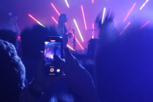 Live band on stage with radial light beams, an Arts & Entertainment Photo by DanFLCreativo