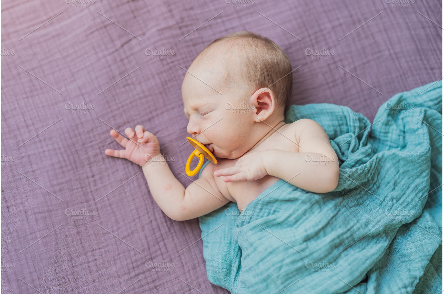 The baby is sleeping peacefully in, a Person Photo by Elizaveta Galitskaya