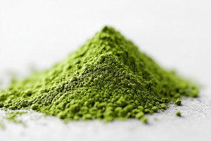 Heap of vibrant green matcha tea, a Food & Drink Photo by MistyDay