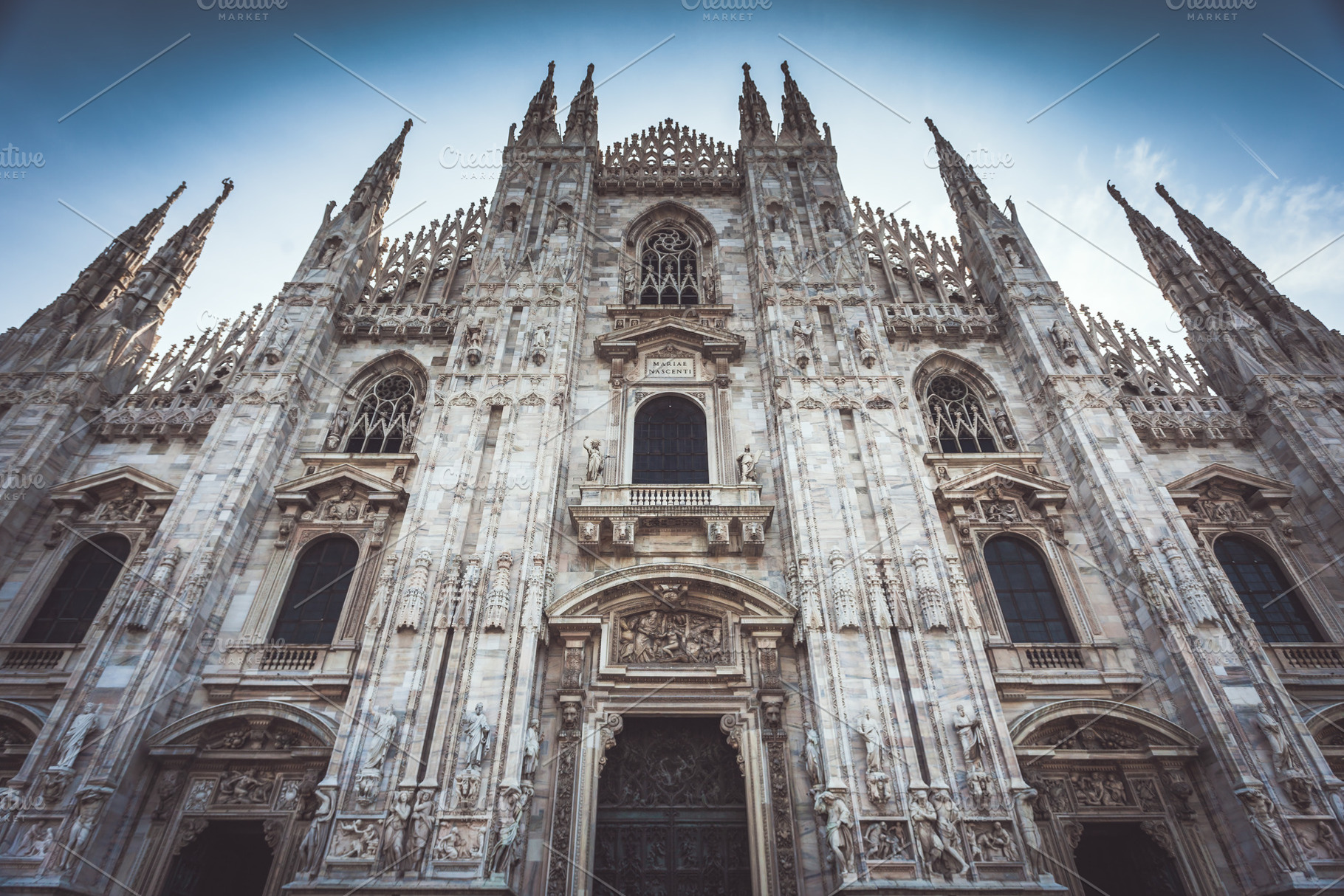Details of facade of gothic cathedral Duomo of Milano, a Photo by Dolce Vita
