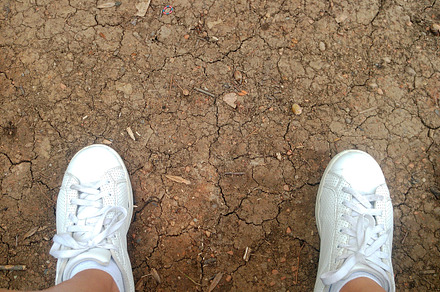 Dirty Cracked Soil with sneakers, an Abstract Photo by TrixVFX