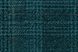 Seamless pattern dark teal fabric close up showing woven wool te