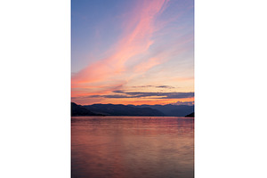 Sunset over Lake Chelan with, a Nature Photo by Backyard Stock