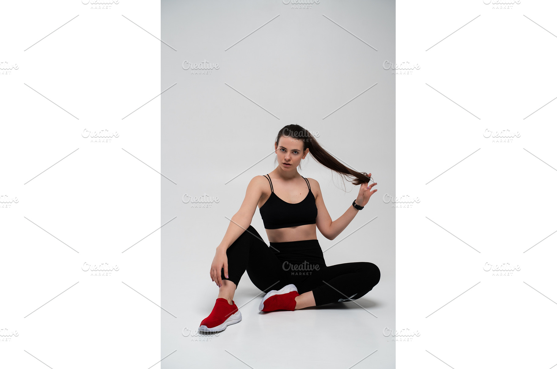 Young fitness woman in black sports, a Sports & Recreation Photo by volodymyrshtun13795