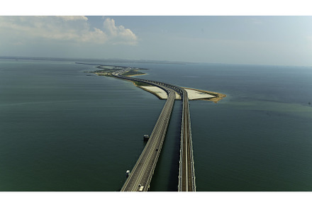 Bird's eye view. Shot.A huge bridge, an Architecture Photo by Media Whale Stock