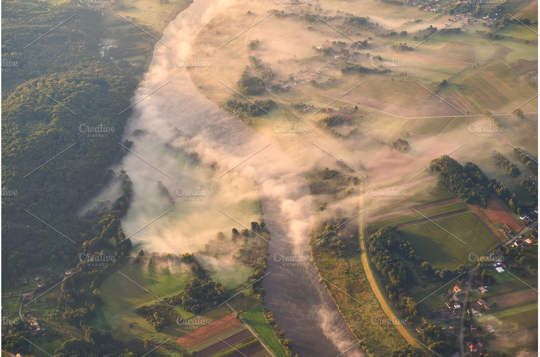 Aerial shot of a misty river at, a Nature Photo by Oleksandr Berezko