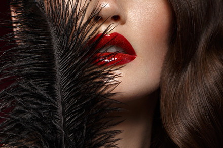 A beautiful girl with evening makeup a hollywood wave and a black feather in, a Beauty & Fashion Photo by KOBRIN|PHOTO