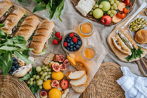 Picnic spread with tasty treats, a Photo by Pavel_design