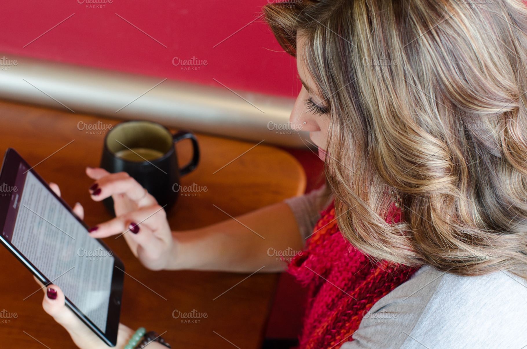 woman using a tablet, a Technology Photo by Androo Interactive