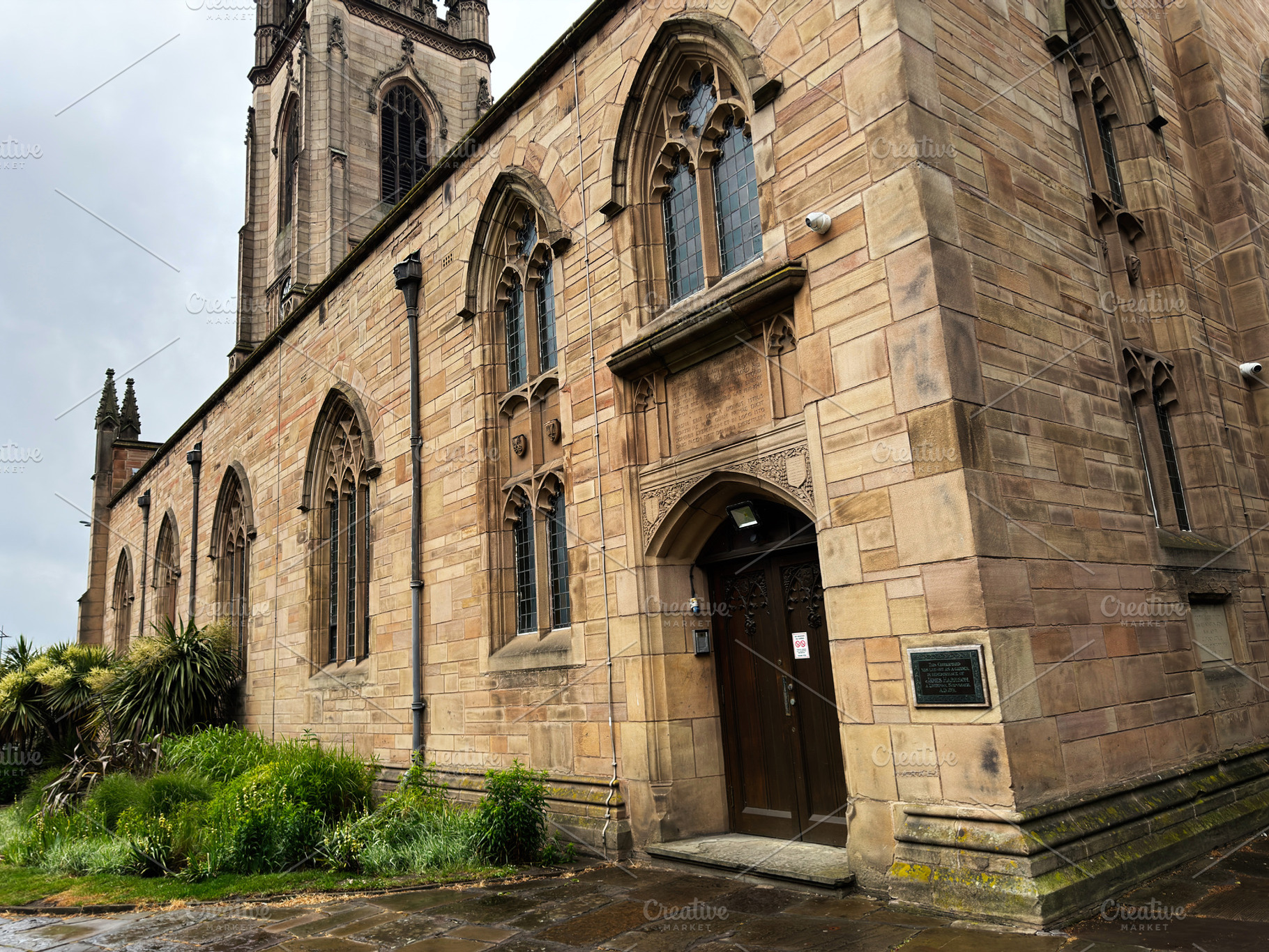 Historic sandstone church architecture in Liverpool, UK with Got, a Photo by AS photostudio