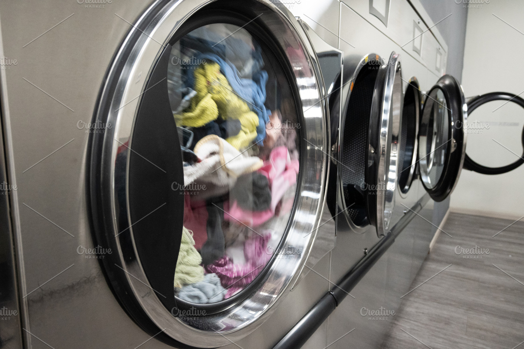 Modern Self-Service Laundromat with Industrial Washing Machines, an Industrial Photo by etorres69