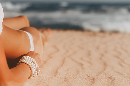  woman on exotic sandy ocean beach