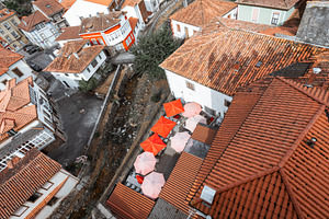 Aerial view of Salas rooftops, an Architecture Photo by SkyNext