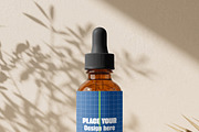 Amber Glass Dropper Bottle Mockup, a Packaging Mockup by Pixel Foundry (Thumbnail 5 of 6)