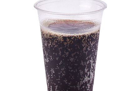 soda in clear plastic cup