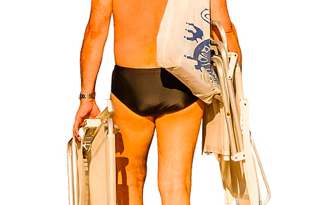 Adult man walking in a swimsuit isolated photo, a Person Photo by DanFLCreativo
