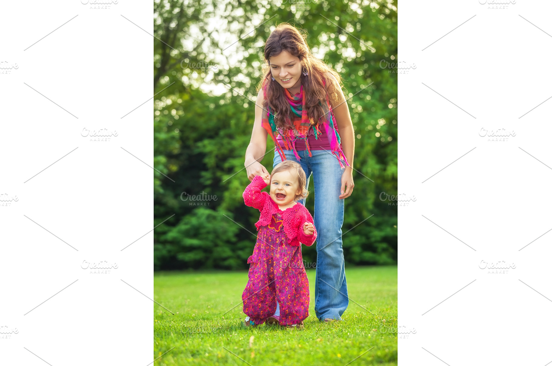 Mother with baby in the park, a Person Photo by sborisov