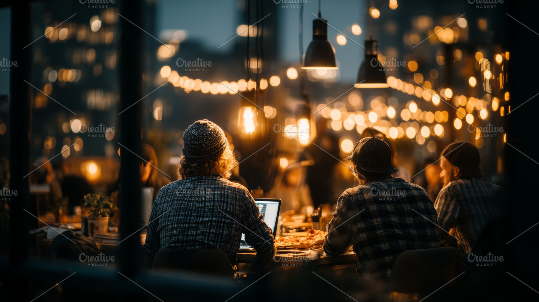 Group collaboration over laptops and food in a warmly lit outdoor setting, a Business Photo by AS photostudio