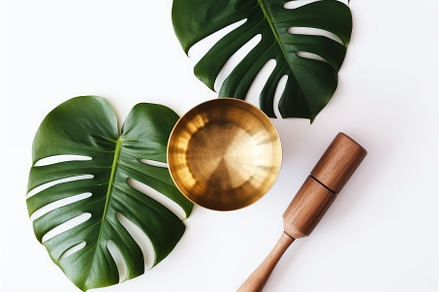 Golden singing bowls reiki. Generate, an Abstract Photo by Ylivdesign