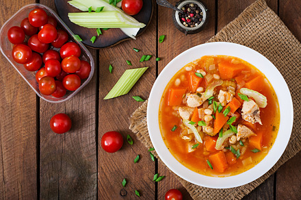Tomato chicken soup featuring appetizer, background, and bean