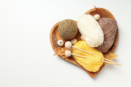 Concept of hobby, knitting, space for text, a Beauty & Fashion Photo by AtlasStudio