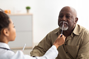 Doctor taking PCR test sample from potentially infected mature man, a Photo by Prostock-Studio (Thumbnail 1 of 2)