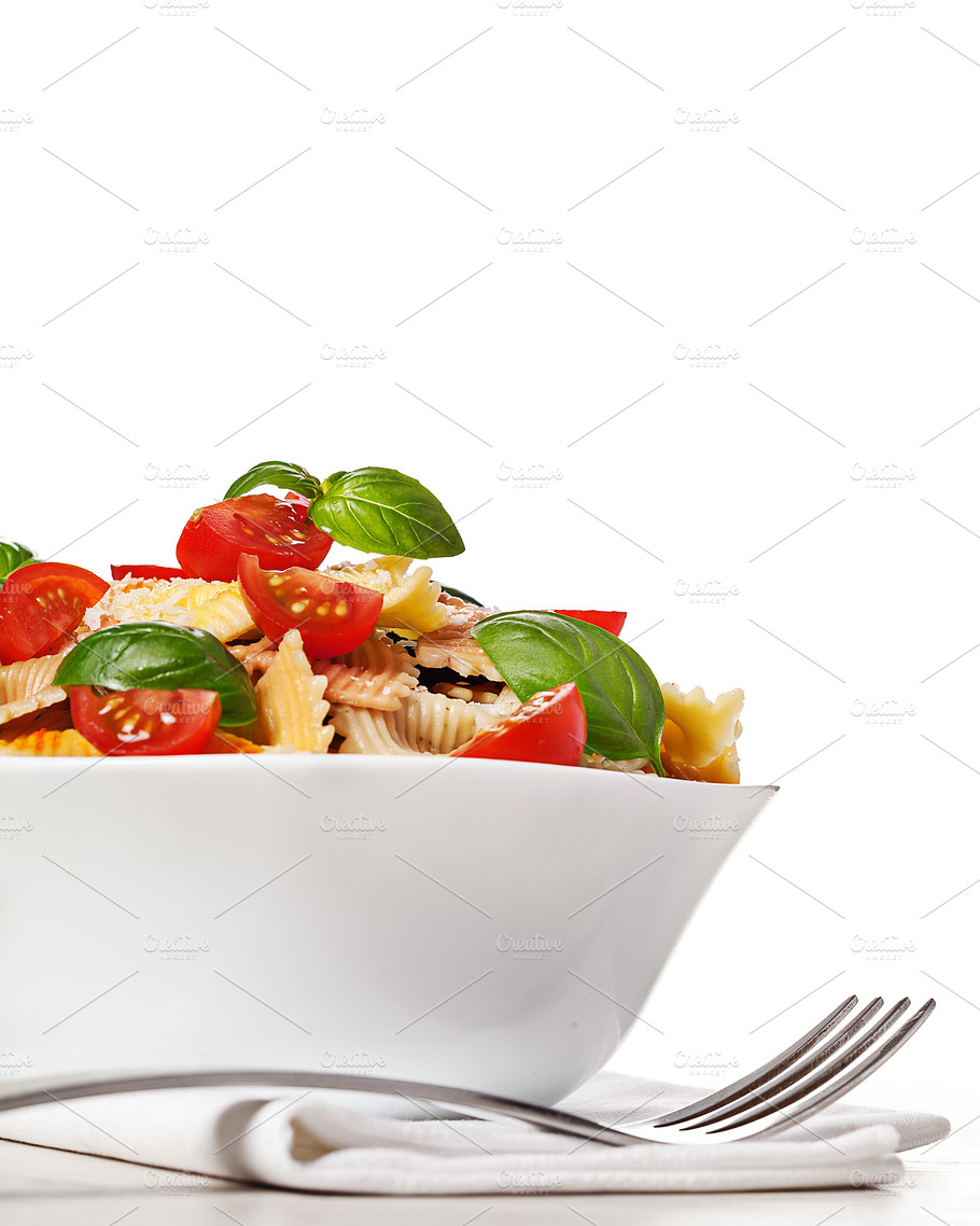 Multicolored Pasta On Light Background Featuring Background Basil And Cheese