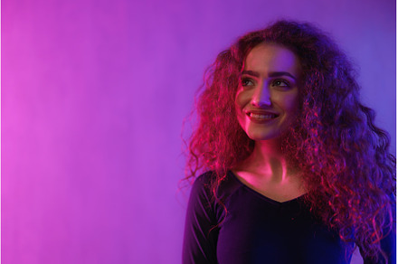 Portrait of a happy young woman, a Person Photo by HalfPoint