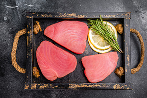 Freshly sliced raw tuna loin fillet, packed with flavor and nutr, a Food & Drink Photo by composter-box@mail.ru