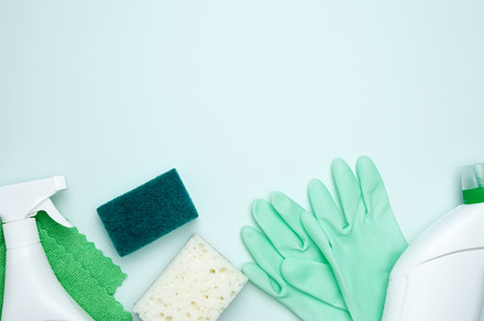 Concept of cleanliness and hygiene. Cleaning supplies and tools, including bott, a Photo by matucha
