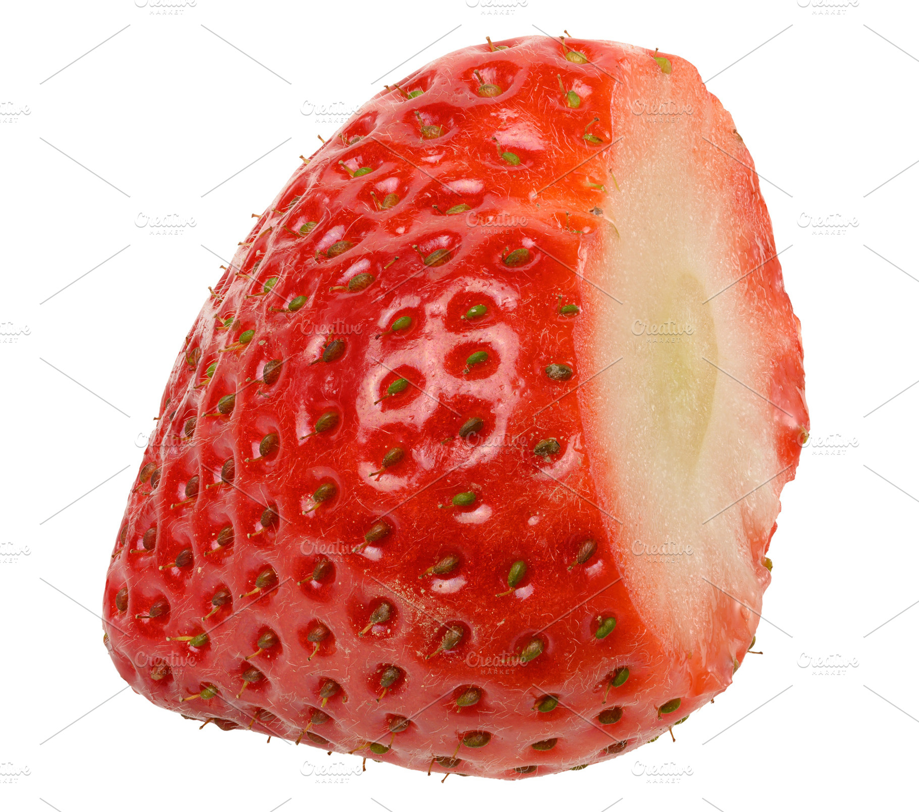Close-up of a ripe red strawberry showing the texture of the ski, a Food & Drink Photo by ndanko