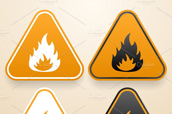 Set Of Triangular Fire Warning Signs