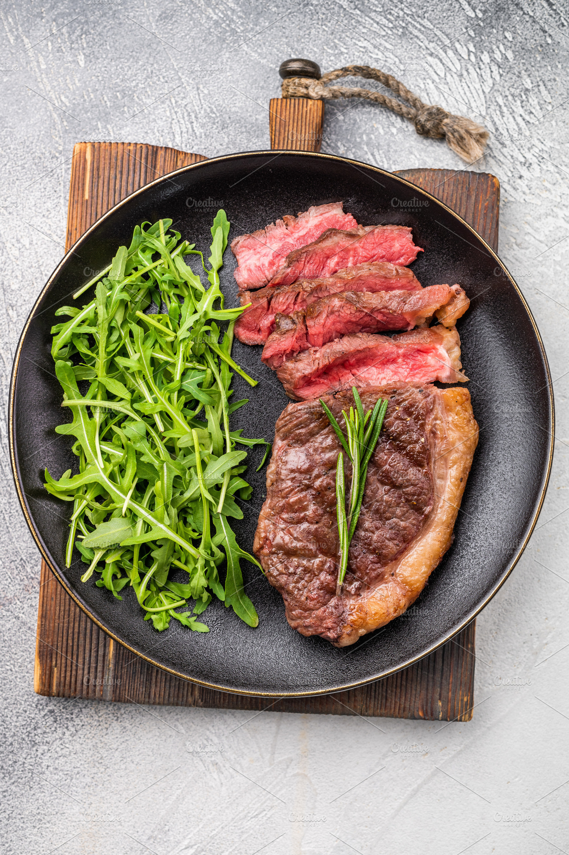 Tender grilled striploin New York steak paired with fresh vegeta, a Food & Drink Photo by composter-box@mail.ru