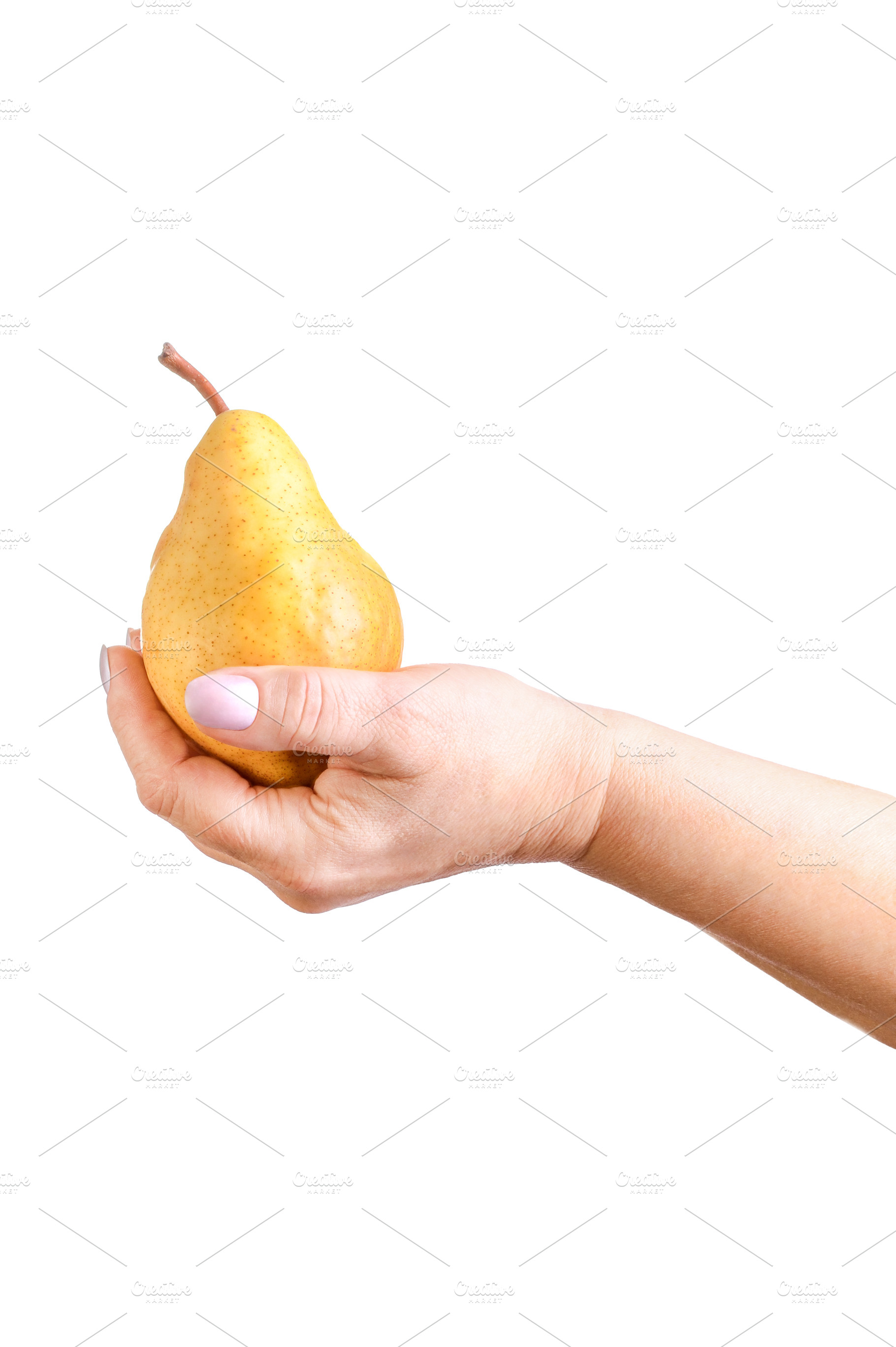 A female hand holding a ripe yellow, a Food & Drink Photo by Apolonia
