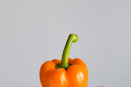 The girl holds colored bell pepper, a Food & Drink Photo by Iuliia Pilipeichenko