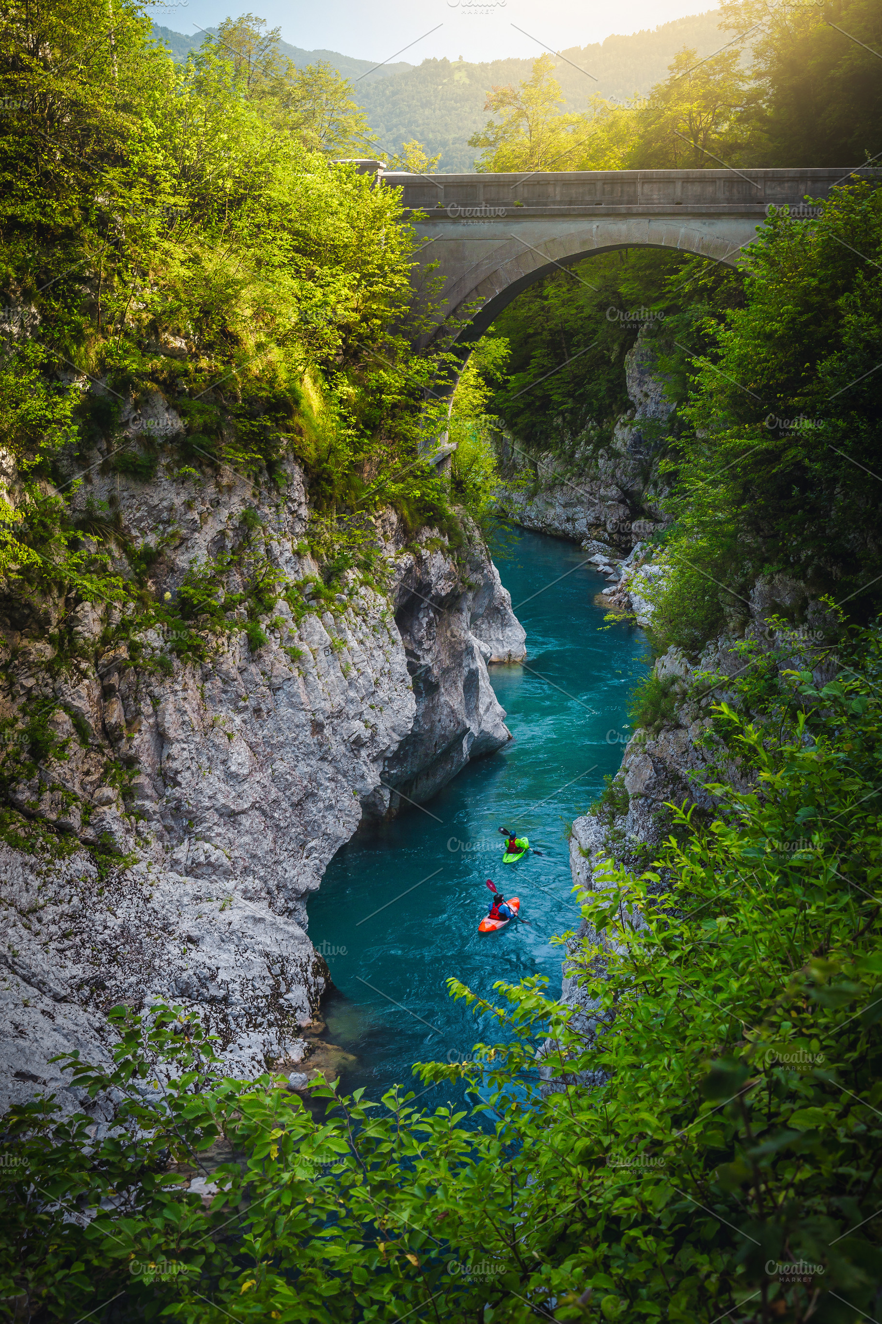 Kayakers exercising on the river, a Sports & Recreation Photo by Alpine Dreams