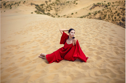 sexy brunette woman in a red long, a Person Photo by SaulichPhoto