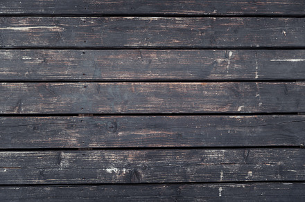 Aged wooden planks with rough texture and natural imperfections
