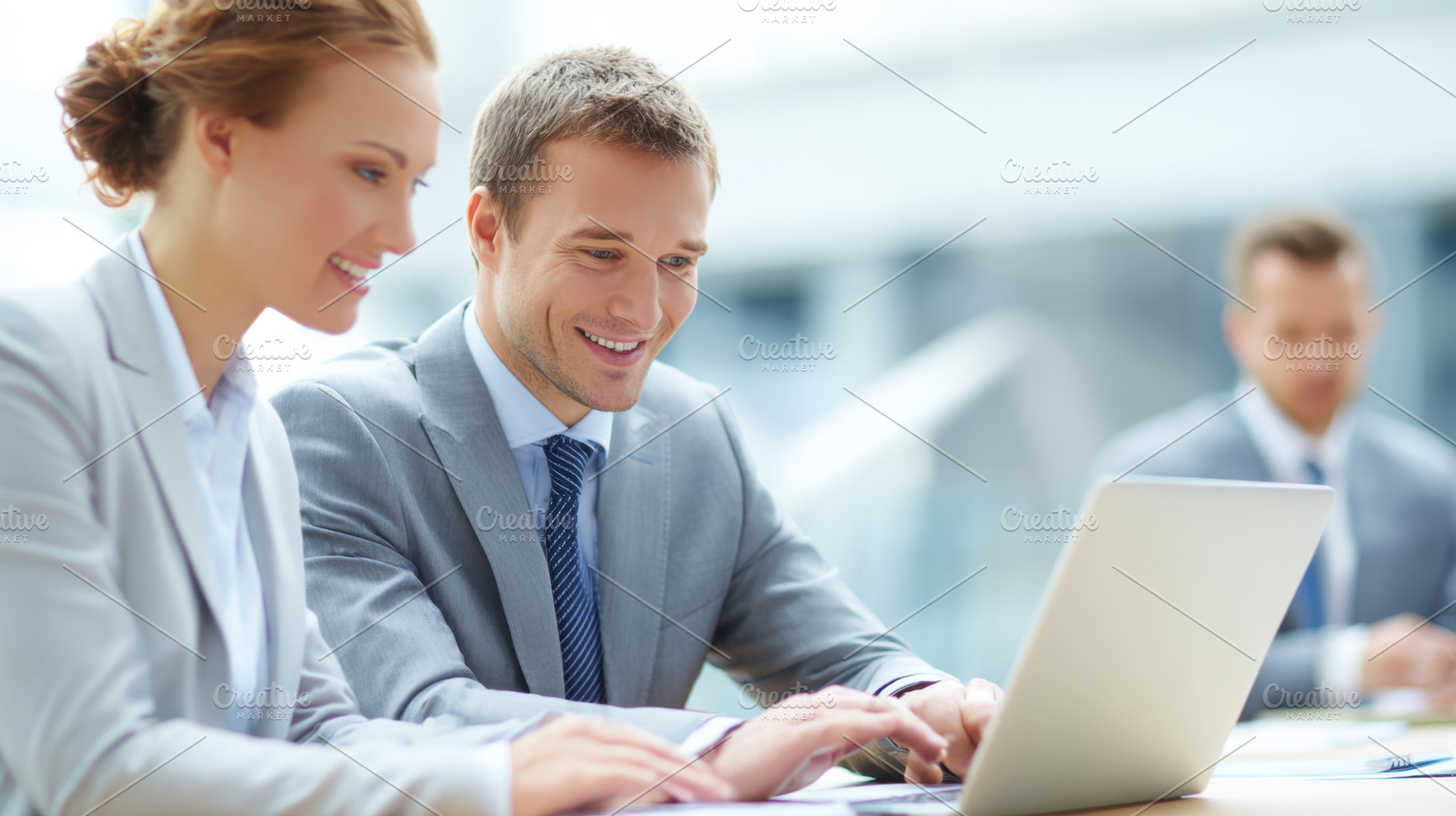Couple works together on laptop, a Photo by Beautiful things
