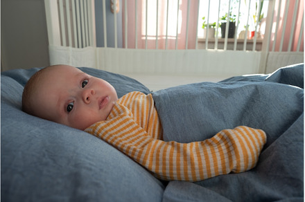 newborn baby boy in the bed, the, a Person Photo by Koldunova