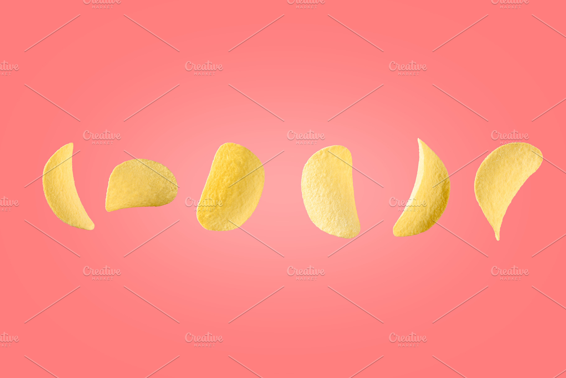 Potato chips isolated on pink, a Food & Drink Photo by Edgieus