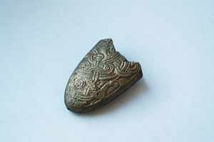 Ancient bronze belt chape fragment, an Architecture Photo by Rohan Photography
