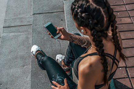 Girl athlete sitting steps resting containing phone, woman, and sport