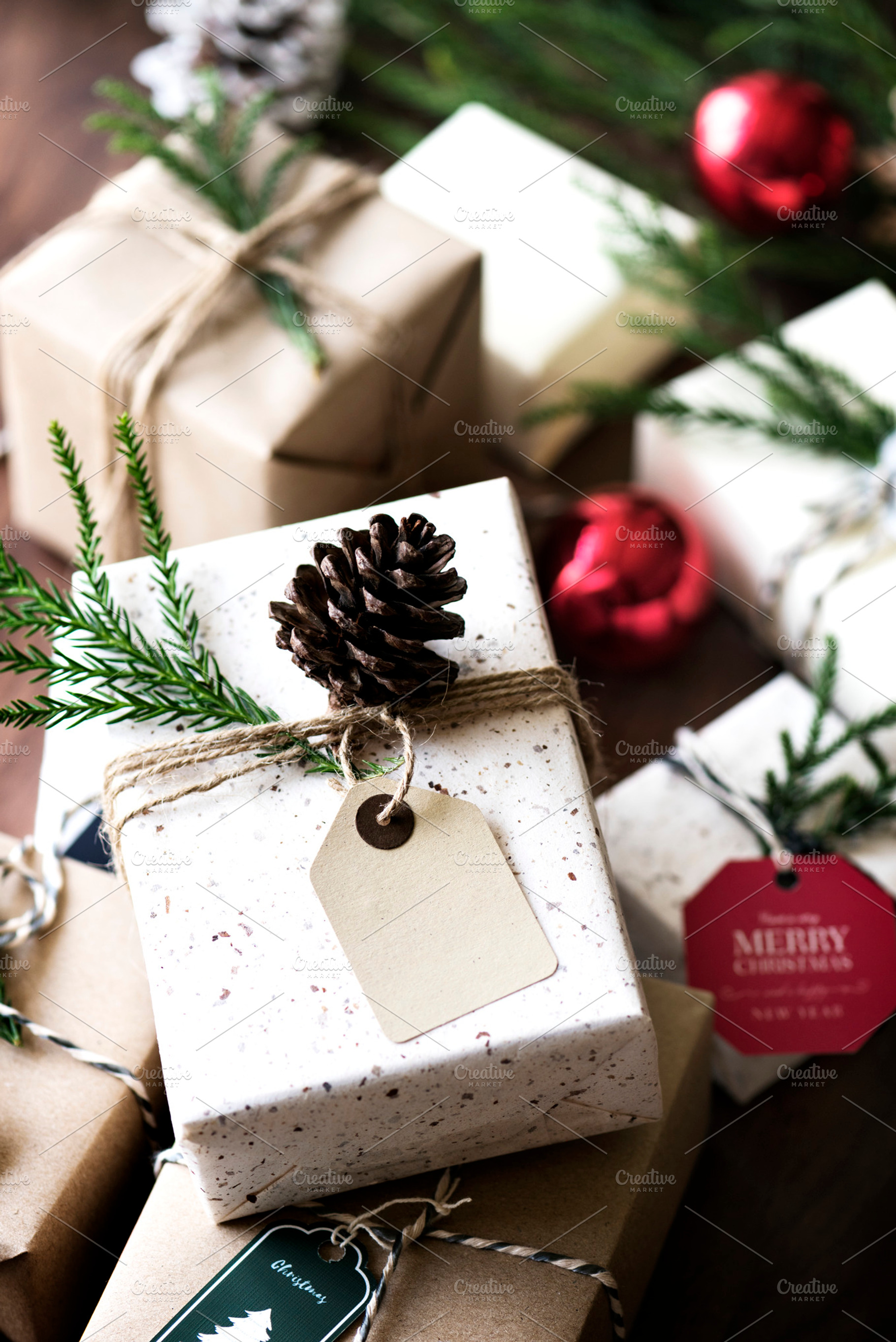 Christmas concept featuring baubales, box, and card, a Holiday Photo by rawpixel