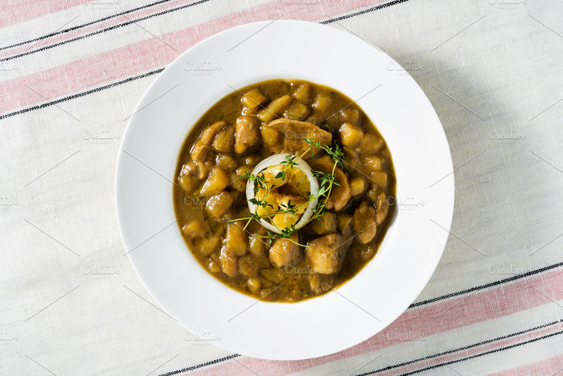 Potato and fresh porcini mushroom soup with caramelized onion. M, a Food & Drink Photo by IriGri