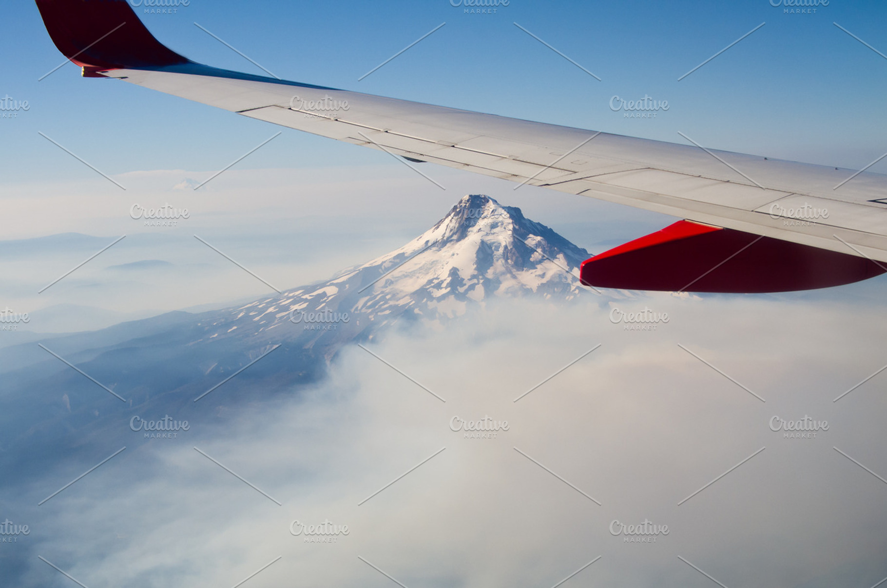 Snowy Mountain Under Aircraft Wing