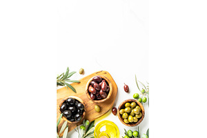 Olives in wooden bowls and Olive oil, a Food & Drink Photo by Nadia-nb