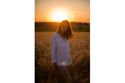 Woman in White Shirt at Sunset in, a Person Photo by Jan Jack Russo Media