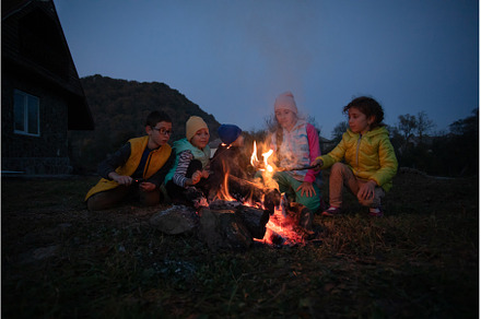 Children after hiking have a picnic, a Nature Photo by oksix