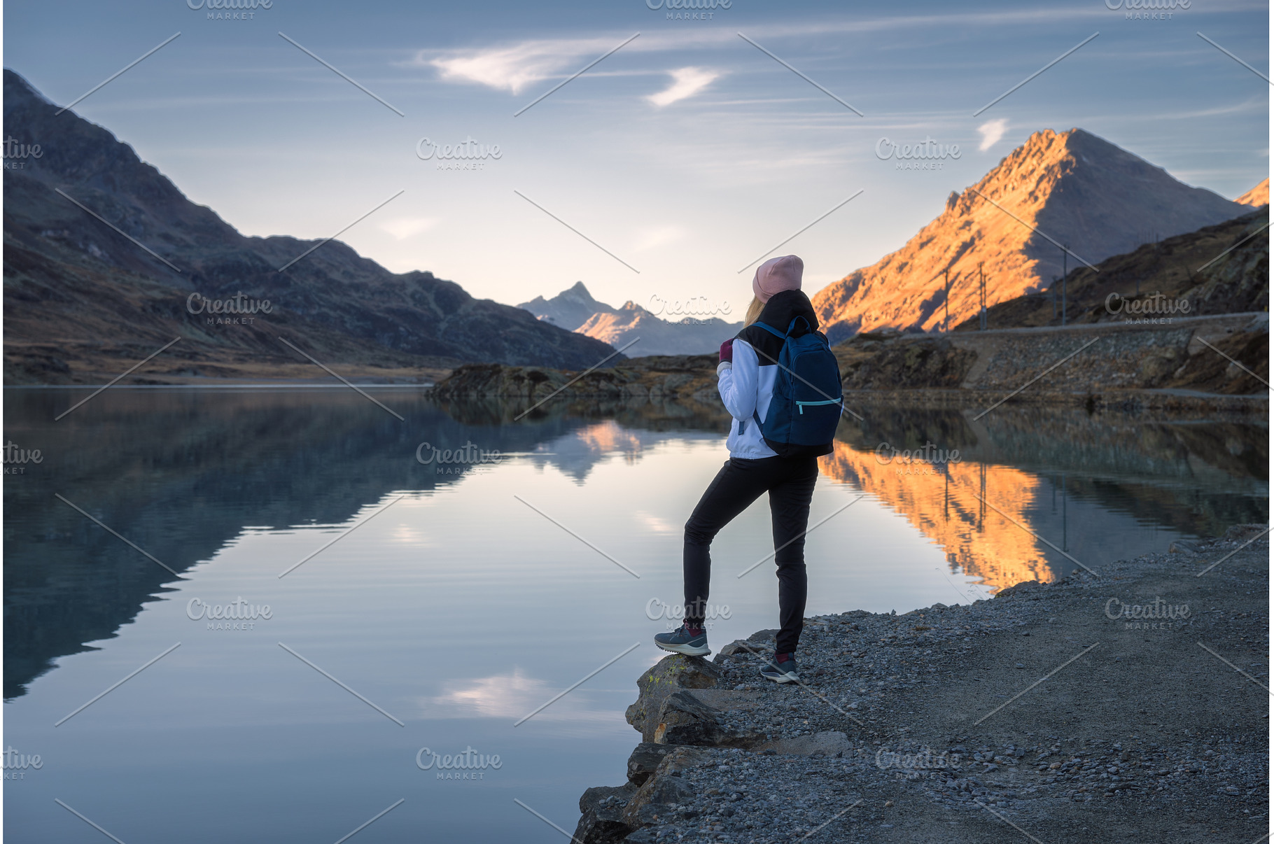 Young woman hiker with backpack, a Person Photo by den-belitsky